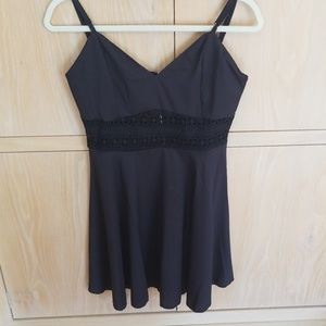 Black little  dress with cut out lace on the waist